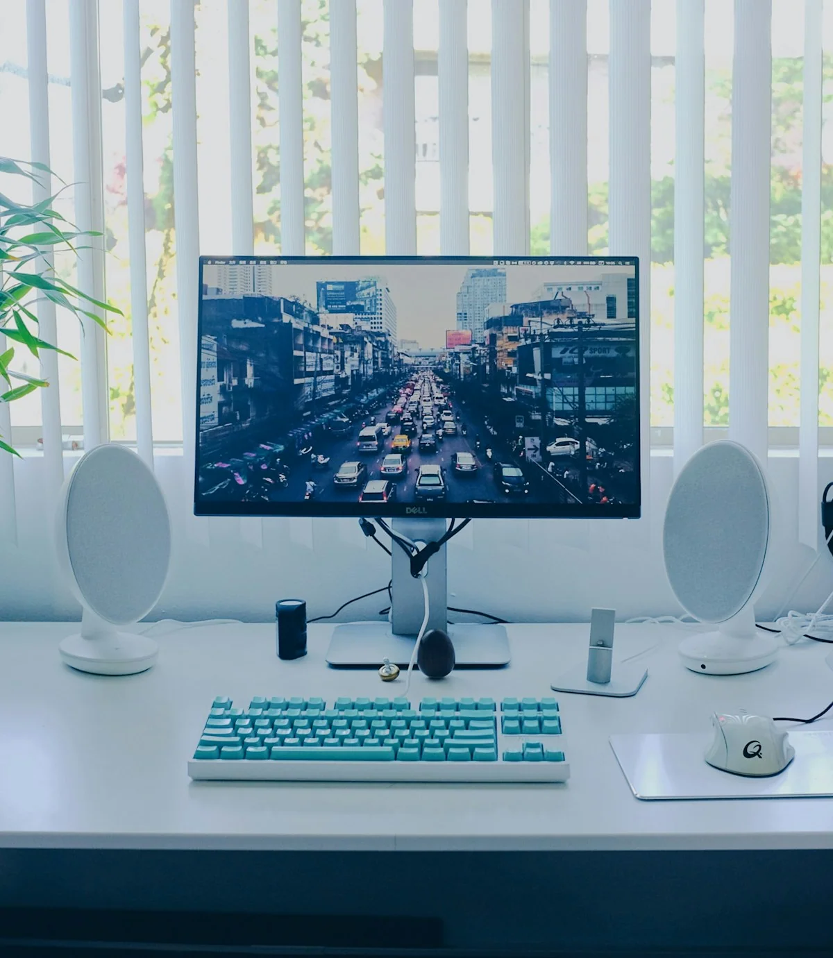 A laptop, monitor and peripherals ready for a new team member