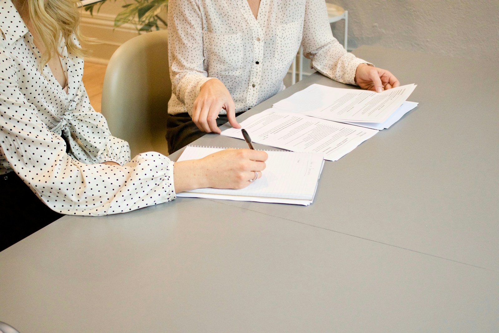 Signing a contractor agreement in warm natural light